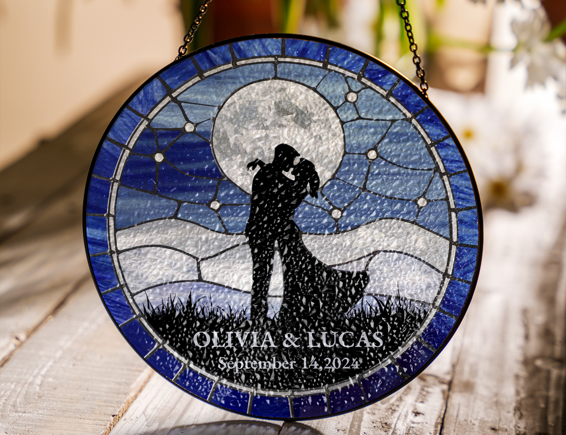 kissing couple under full moon suncatcher
