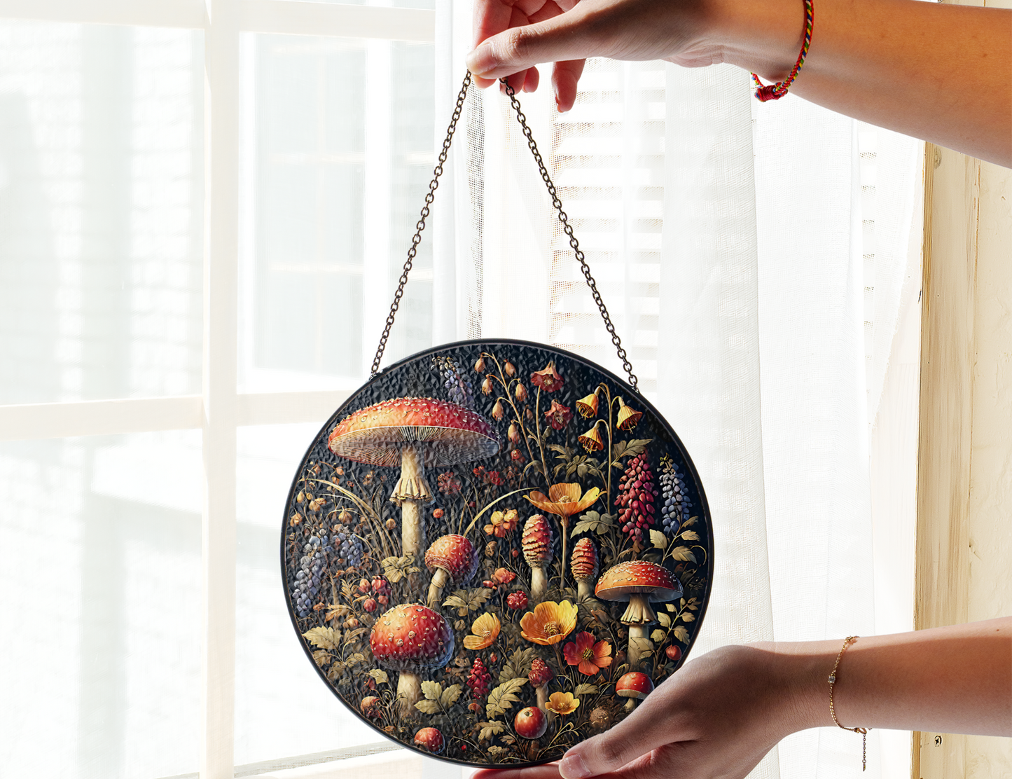 mushrooms and wildflowers suncatcher in front of window