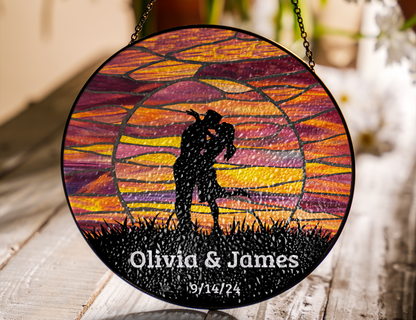 kissing couple at sunset suncatcher