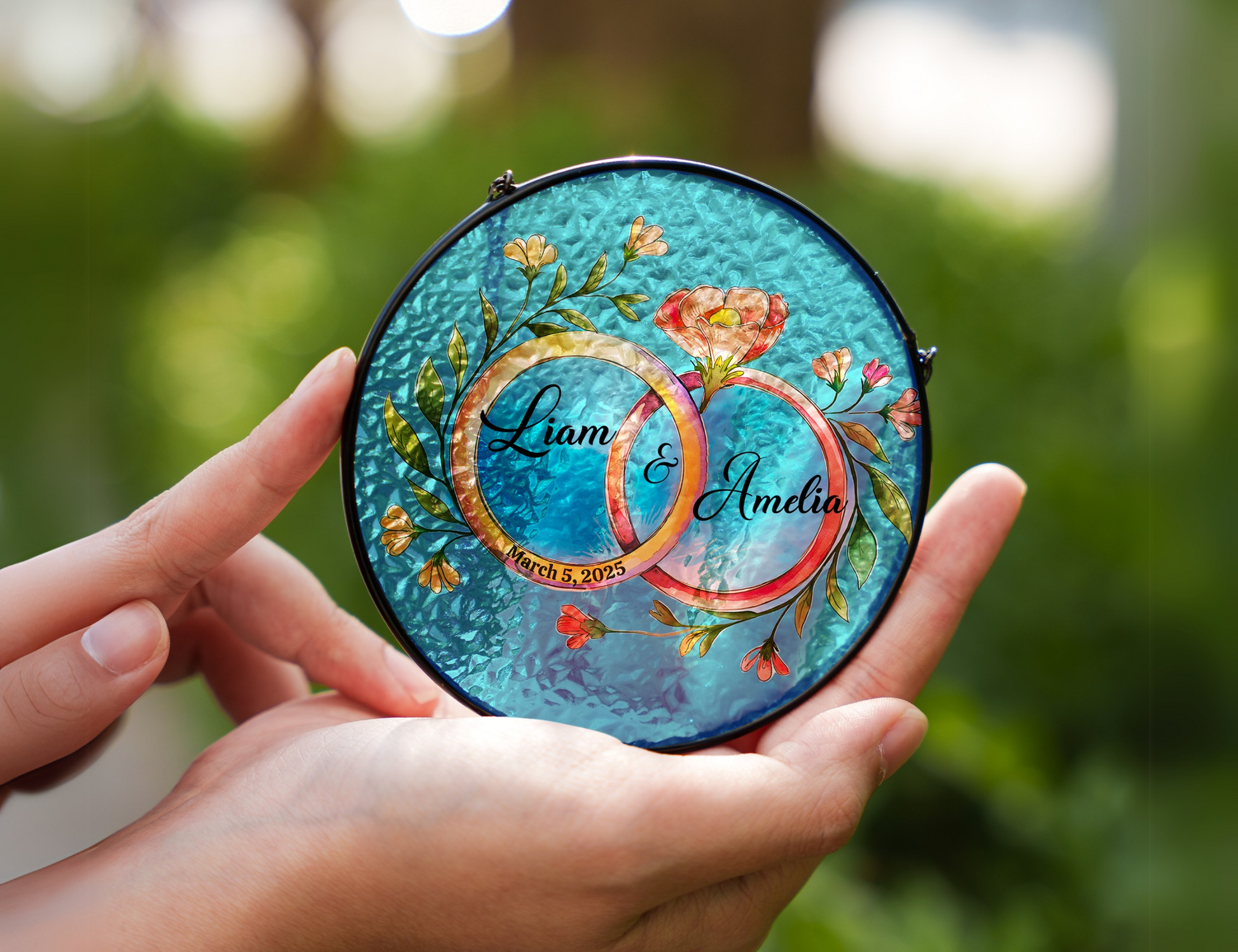 double ring floral personalized suncatcher in hands