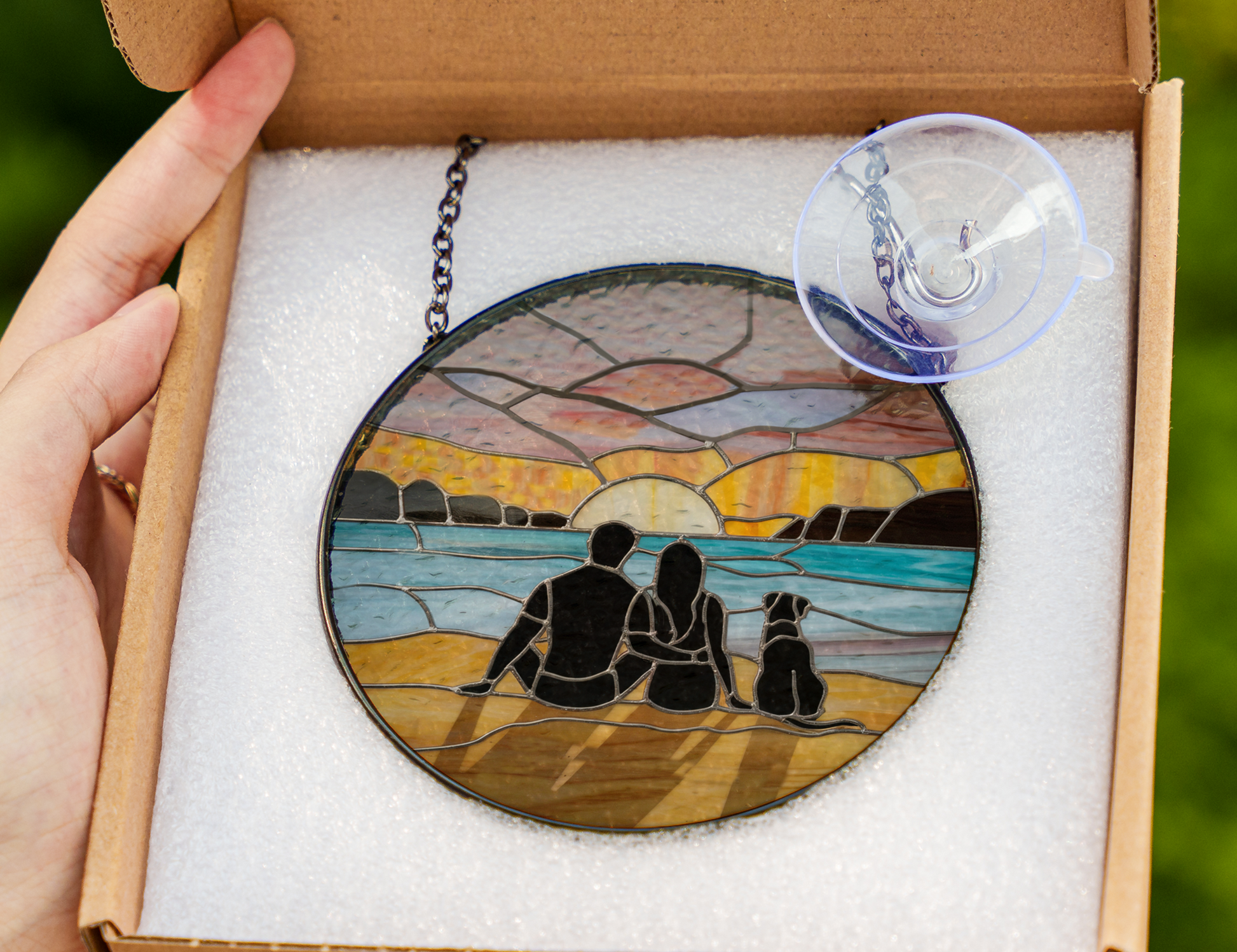 couple and dog at beach sunrise suncatcher packaging