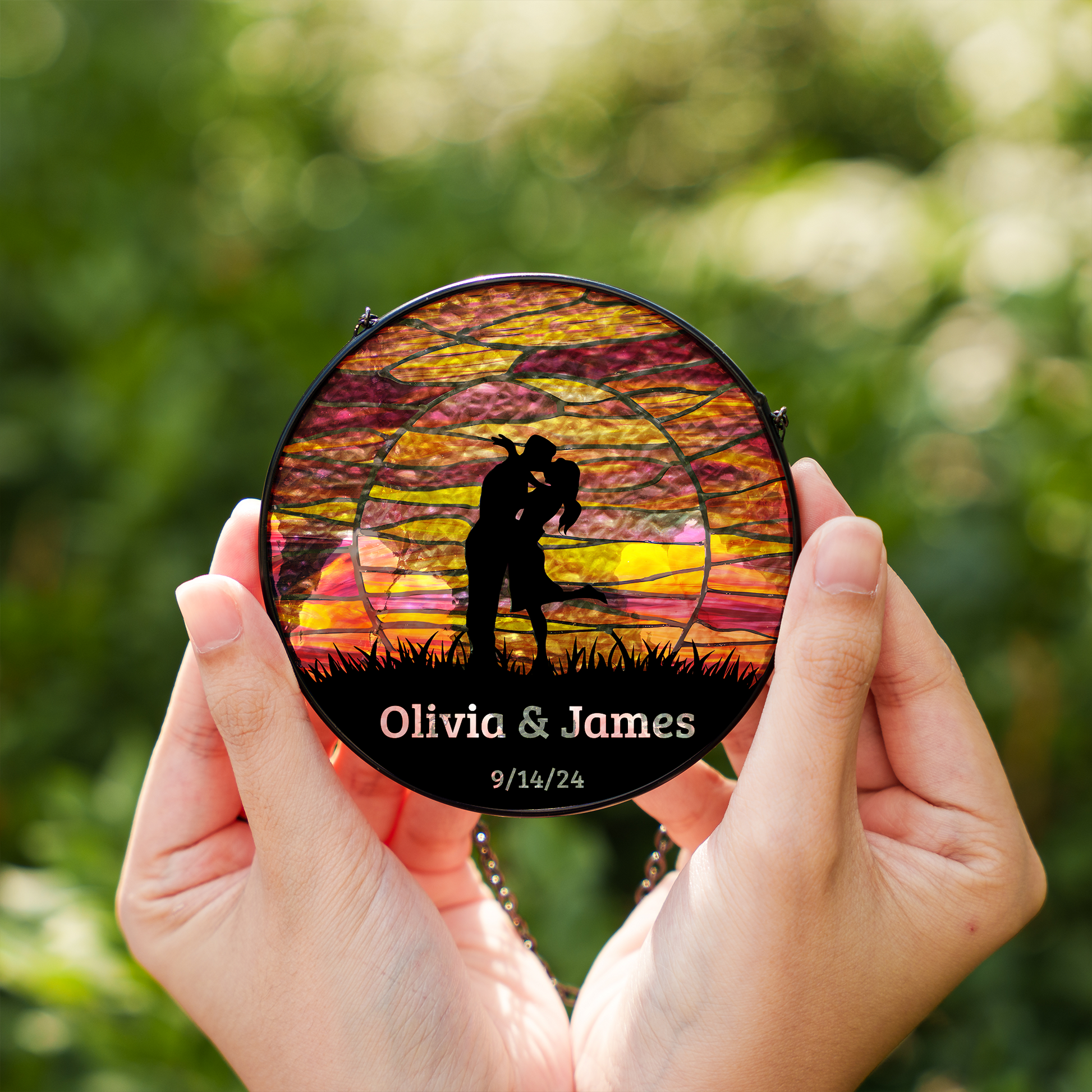 small size kissing couple at sunset suncatcher