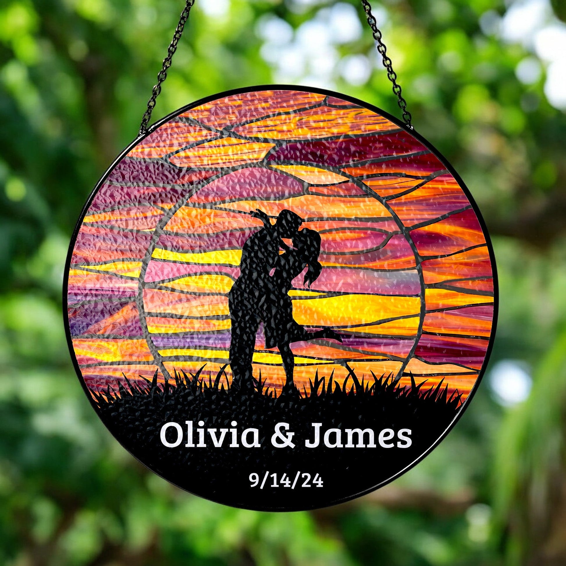 kissing couple at sunset suncatcher outdoor