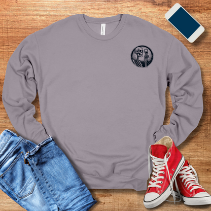 front pocket design of skeleton toasting with wine glass on storm colored sweatshirt