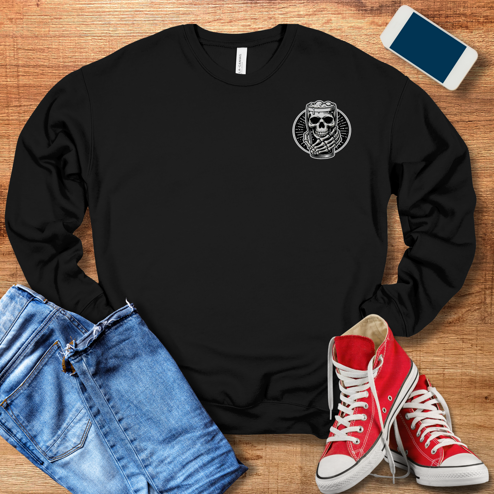 skeleton hand holding beer on front of black crewneck sweatshirt