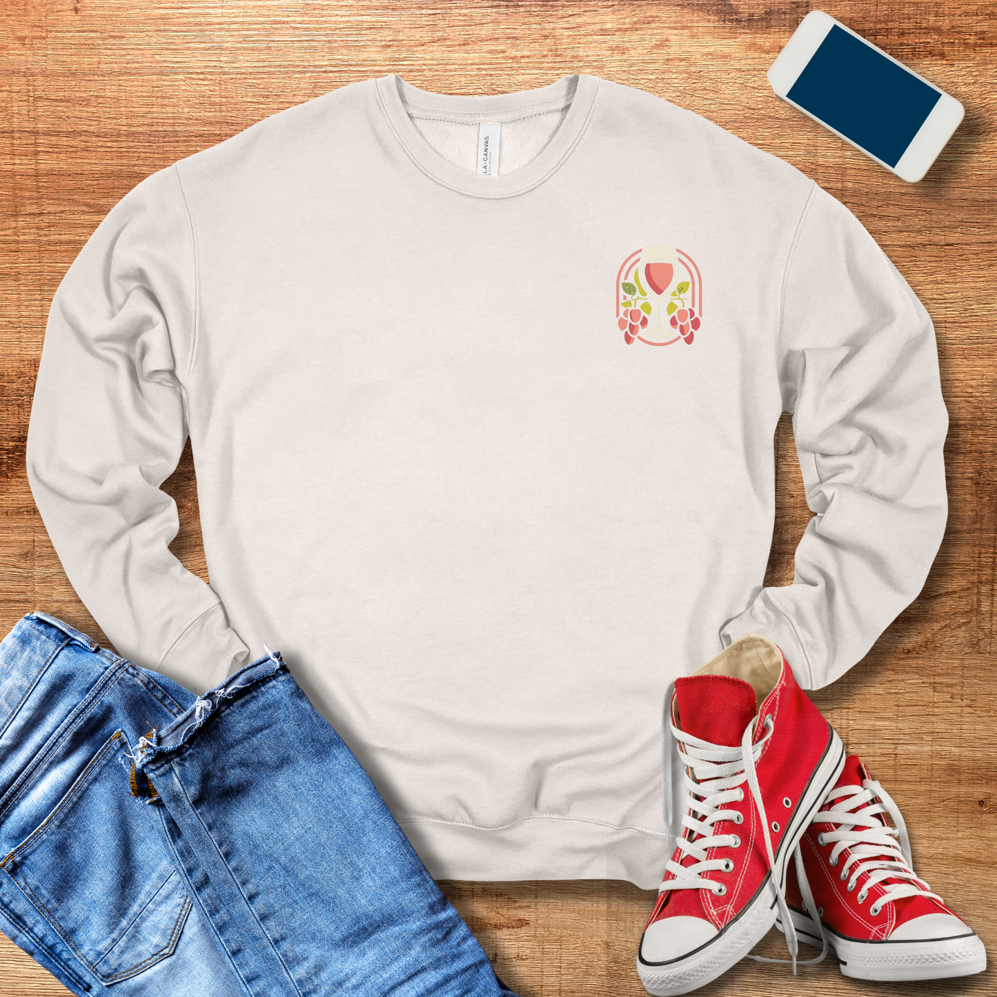 wine glass on front of heather dust colored sweatshirt