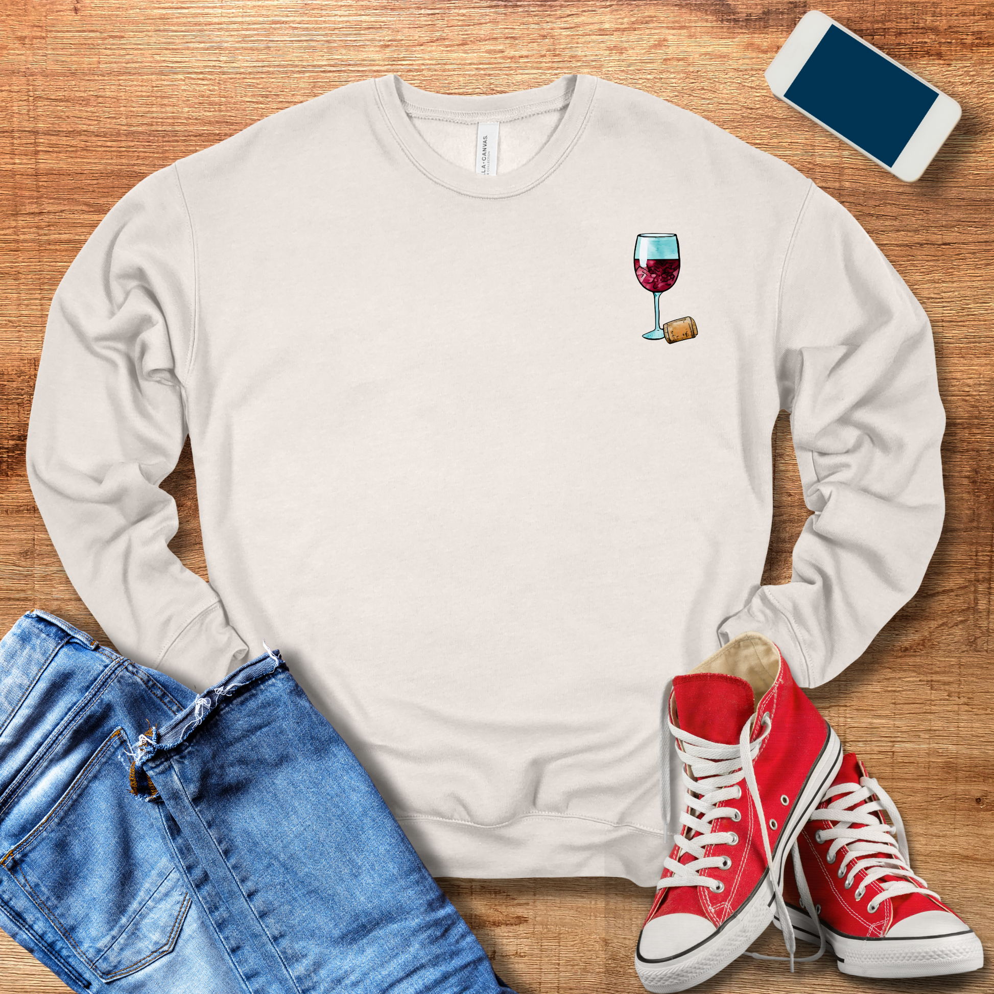 wine glass pocket design on the front of sweatshirt in the color heather dust