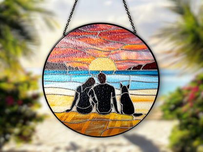 couple and dog at beach at sunset suncatcher at the beach
