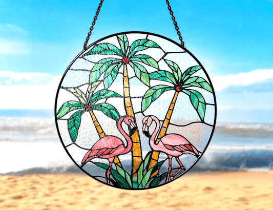 flamingos and palm trees suncatcher at the beach