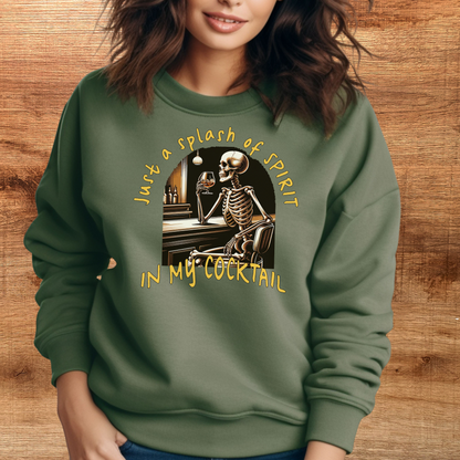 female model wearing just a splash of spirit in my cocktail crewneck sweatshirt in color military green